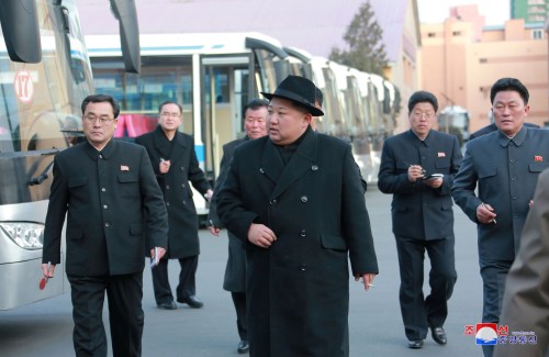 North Korean leader Kim Jong Un inspects a newly established Pyongyang trackless trolley factory in this undated photo released by North Korea's Korean Central News Agency (KCNA) in Pyongyang on February 1, 2018.