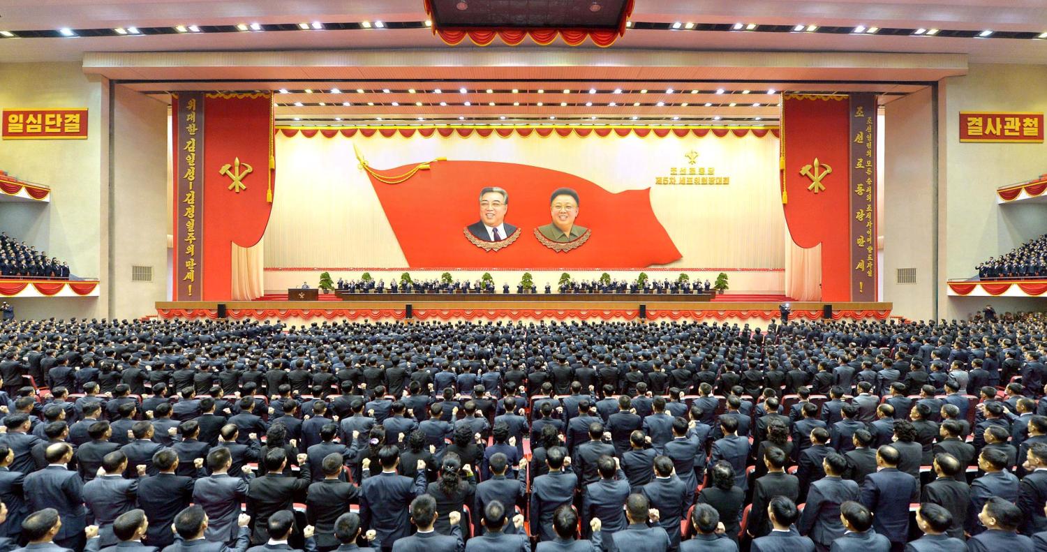 Attendants of the 5th Conference of Cell Chairpersons of the Workers' Party of Korea (WPK) hold a meeting to accept a pledge for North Korean leader Kim Jong-un, in this photo released by North Korea's Korean Central News Agency (KCNA) in Pyongyang December 26, 2017. KCNA/via REUTERS
