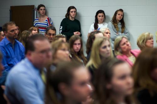 School board meeting with students and parents