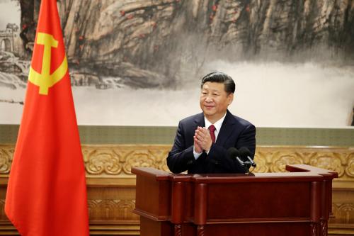 Chinese President Xi Jinping claps after his speech as China's new Politburo Standing Committee members meet with the press at the Great Hall of the People in Beijing, China October 25, 2017. REUTERS/Jason Lee - RC16374CFE10