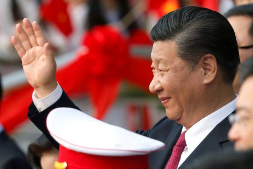 China's President Xi Jinping waves after attending the inauguration ceremony of Chinese sponsored Vietnam-China Cultural Friendship Palace in Hanoi, Vietnam November 12, 2017. REUTERS/Kham - RC1646B28EC0