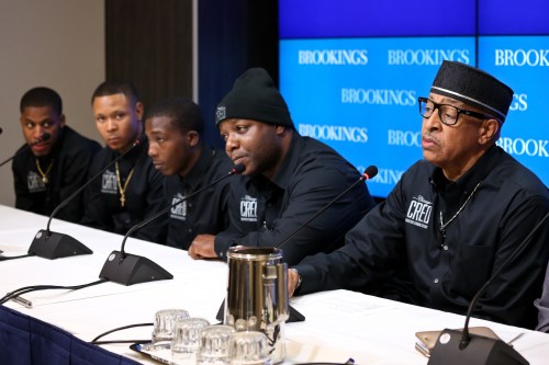 Members from the Chicago CRED organization speak on a panel at the Brookings Institution.