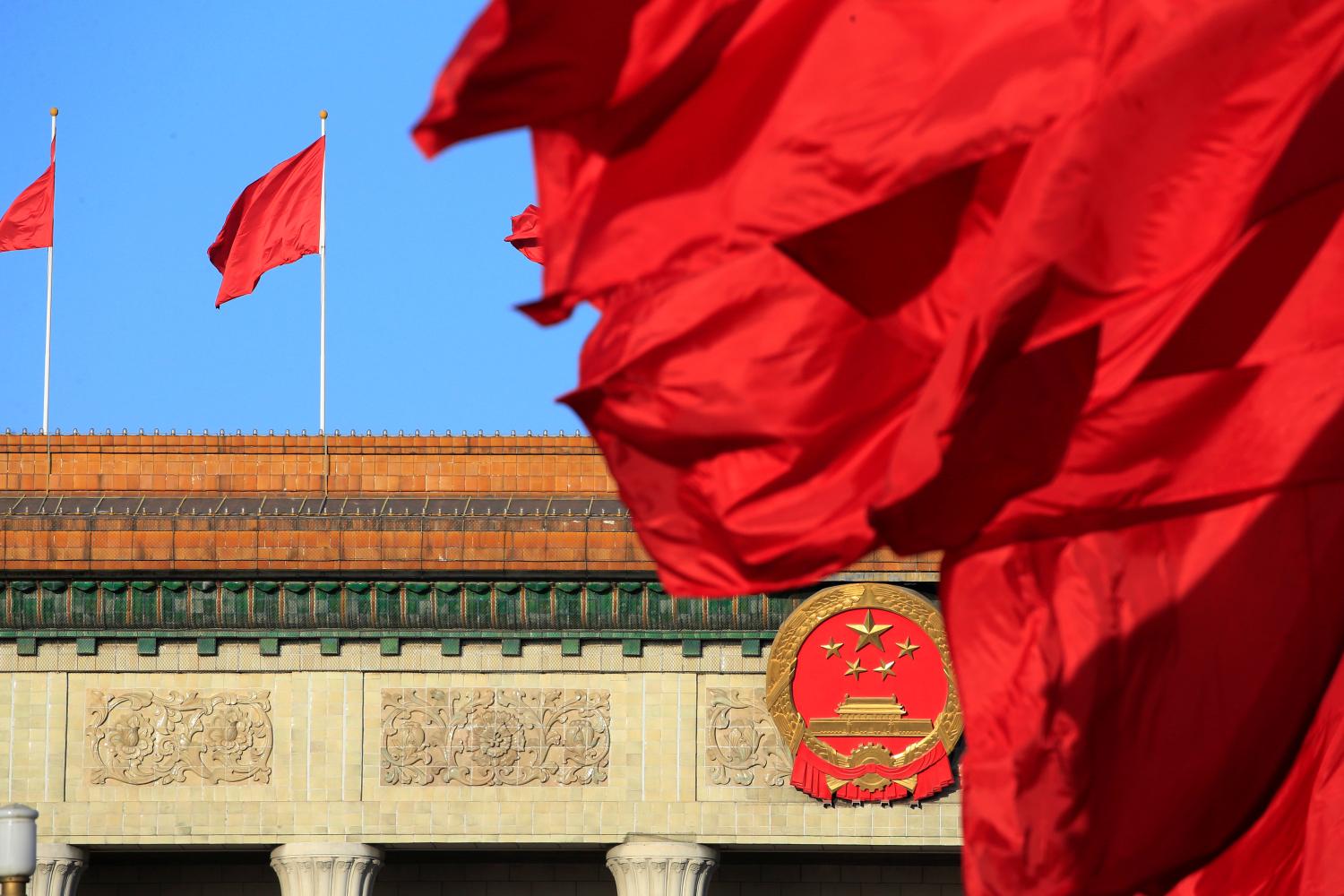 Red flags flutter outside the Great Hall of the People before the second plenary session of the Chinese People's Political Consultative Conference (CPPCC) in Beijing, China March 8, 2018.