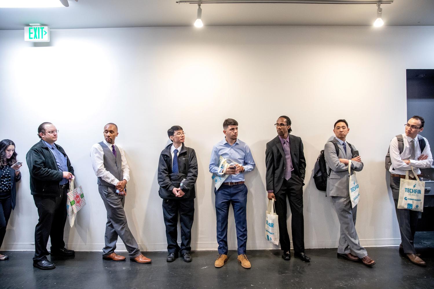 Job seekers and recruiters gather at TechFair in Los Angeles, California.