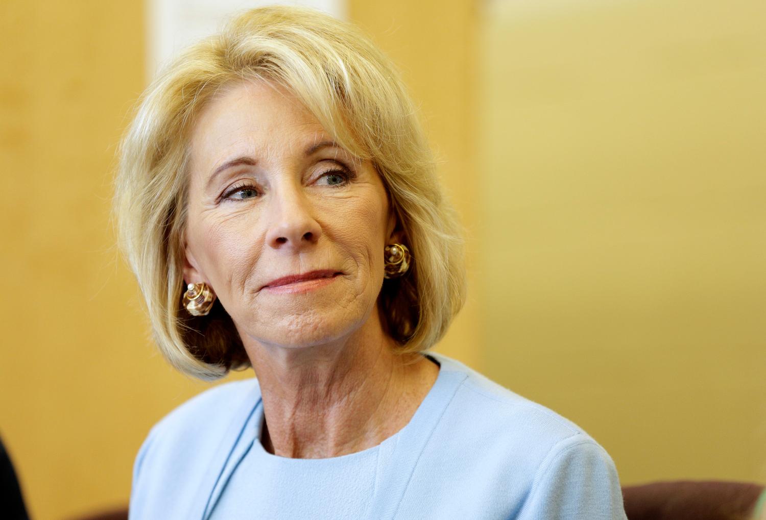 U.S. Secretary of Education Betsy DeVos listens to a presentation during a visit to the Excel Academy public charter school in Washington, U.S., April 5, 2017.