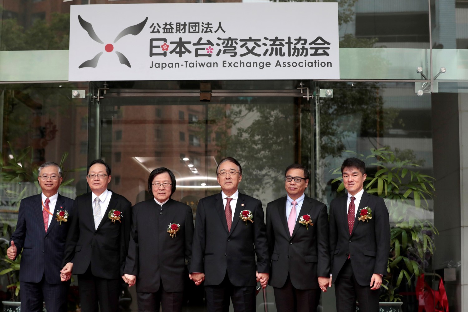 Association of East Asian Relations President Chiou I-jen (3rd-L) and Japanese Representative to Taiwan Mikio Numata (3rd-R) attend a name-changing ceremony of the Japan's de facto embassy from "The Interchange Association, Japan" to "Japan-Taiwan Exchange Association"