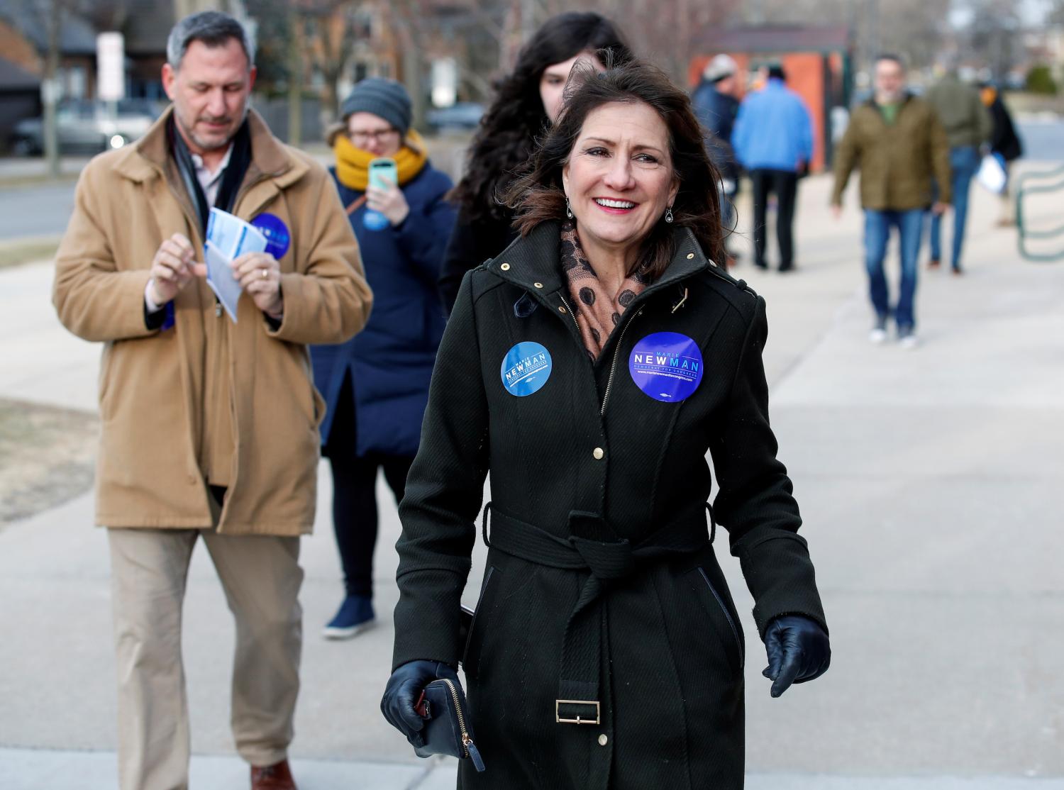 Illinois' 3rd Congressional District candidate for Congress, Marie Newman, arrives to vote in the Democratic Party's congressional primary election at the Lyons Township in La Grange, Illinois, U.S. March 20, 2018. REUTERS/Kamil Krzaczynski - RC1B57676BA0