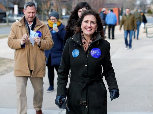 Illinois' 3rd Congressional District candidate for Congress, Marie Newman, arrives to vote in the Democratic Party's congressional primary election at the Lyons Township in La Grange, Illinois, U.S. March 20, 2018. REUTERS/Kamil Krzaczynski - RC1B57676BA0