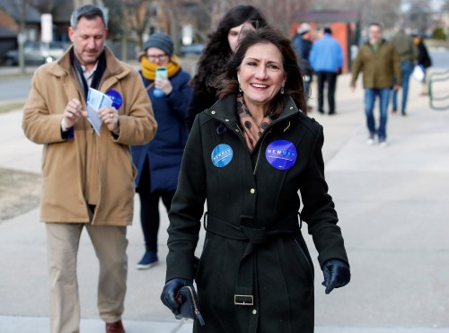 Illinois' 3rd Congressional District candidate for Congress, Marie Newman, arrives to vote in the Democratic Party's congressional primary election at the Lyons Township in La Grange, Illinois, U.S. March 20, 2018. REUTERS/Kamil Krzaczynski - RC1B57676BA0