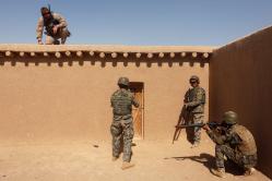 Photo of Marines in Afghanistan training the ANSF.