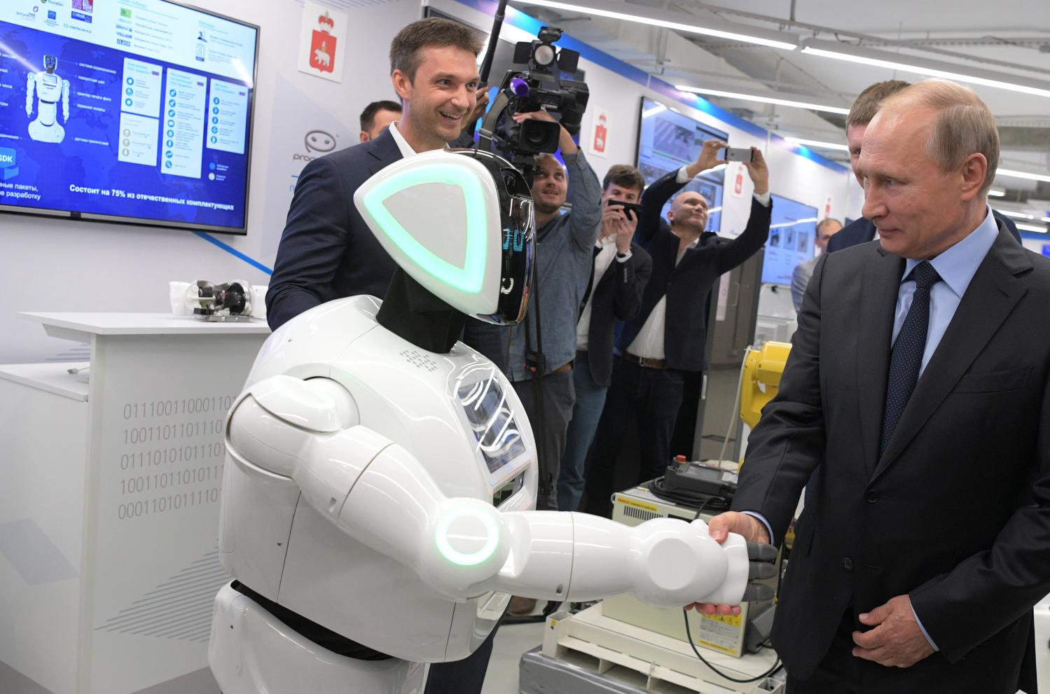 Russian President Vladimir Putin attends an exhibition on information technology as he visits the company ER-Telecom Holding in Perm, Russia September 8, 2017. Sputnik/Mikhail Klimentyev/Kremlin via REUTERS