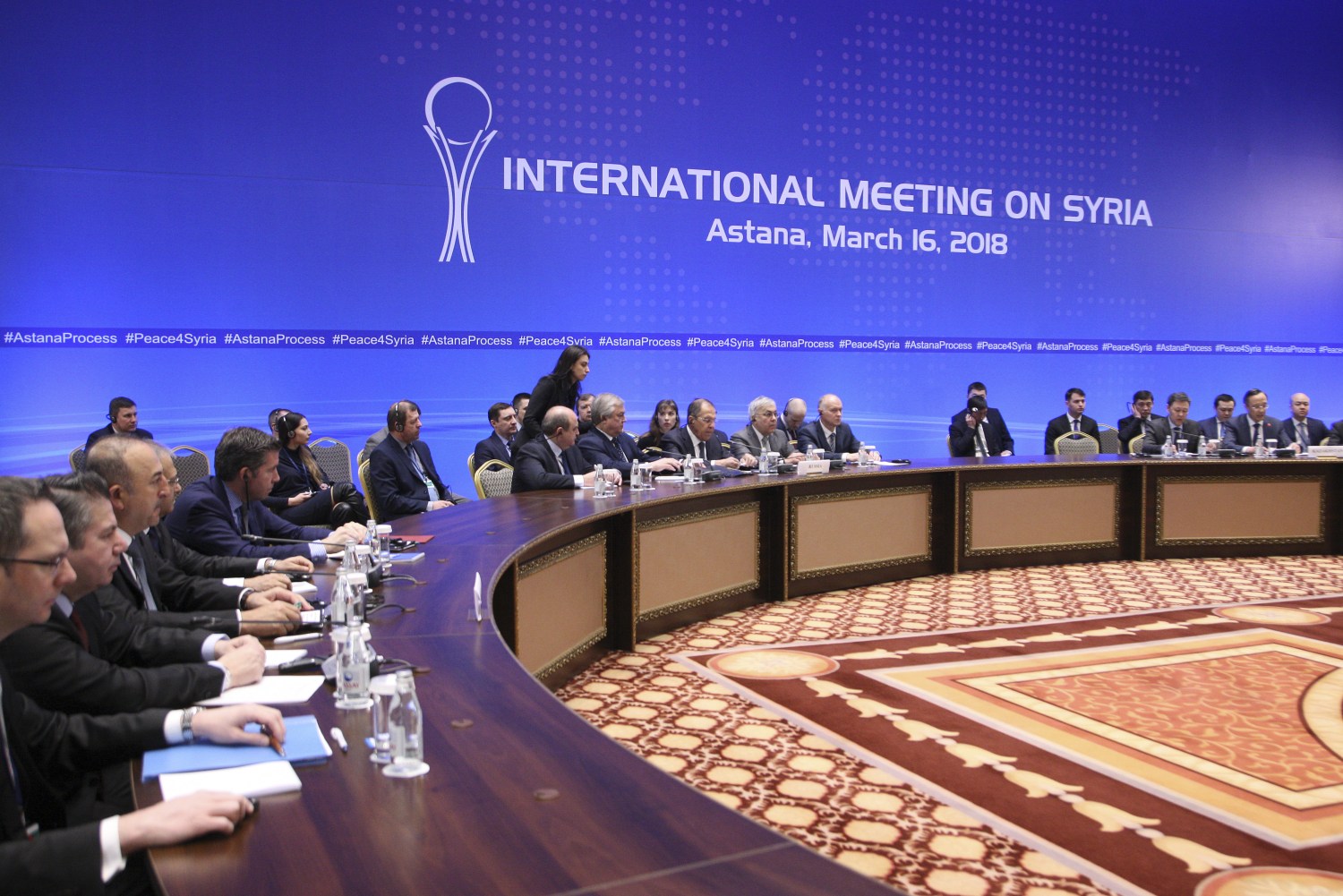 Members of the delegations take part in the international meeting on Syria in Astana