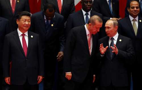 Chinese President Xi Jinping, Russian President Vladimir Putin, Turkey's President Erdogan pose for a group picture during the G20 Summit in Hangzhou