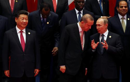 Chinese President Xi Jinping, Russian President Vladimir Putin, Turkey's President Erdogan pose for a group picture during the G20 Summit in Hangzhou
