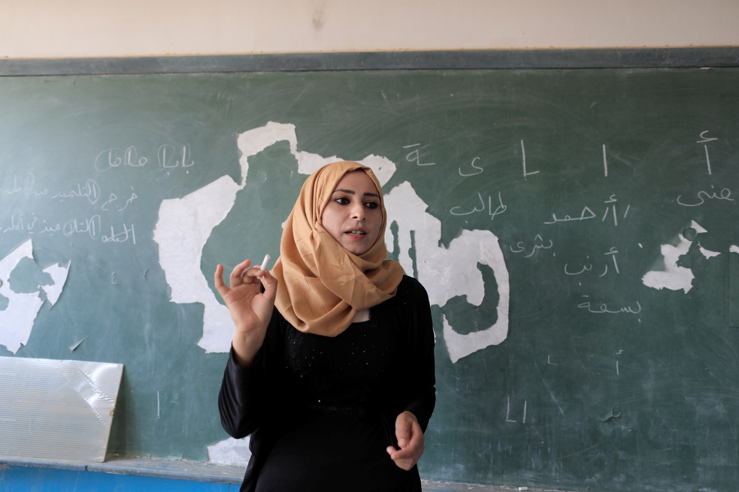 A teacher attends her class at the school in Hazema North Raqqa, Syria August 21, 2017. Picture taken August 21, 2017. REUTERS/Zohra Bensemra -