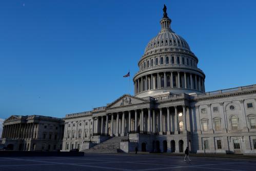 People walk by the U.S. Capitol building in Washington, U.S., February 8, 2018. REUTERS/ Leah Millis - RC17BD8F7BC0