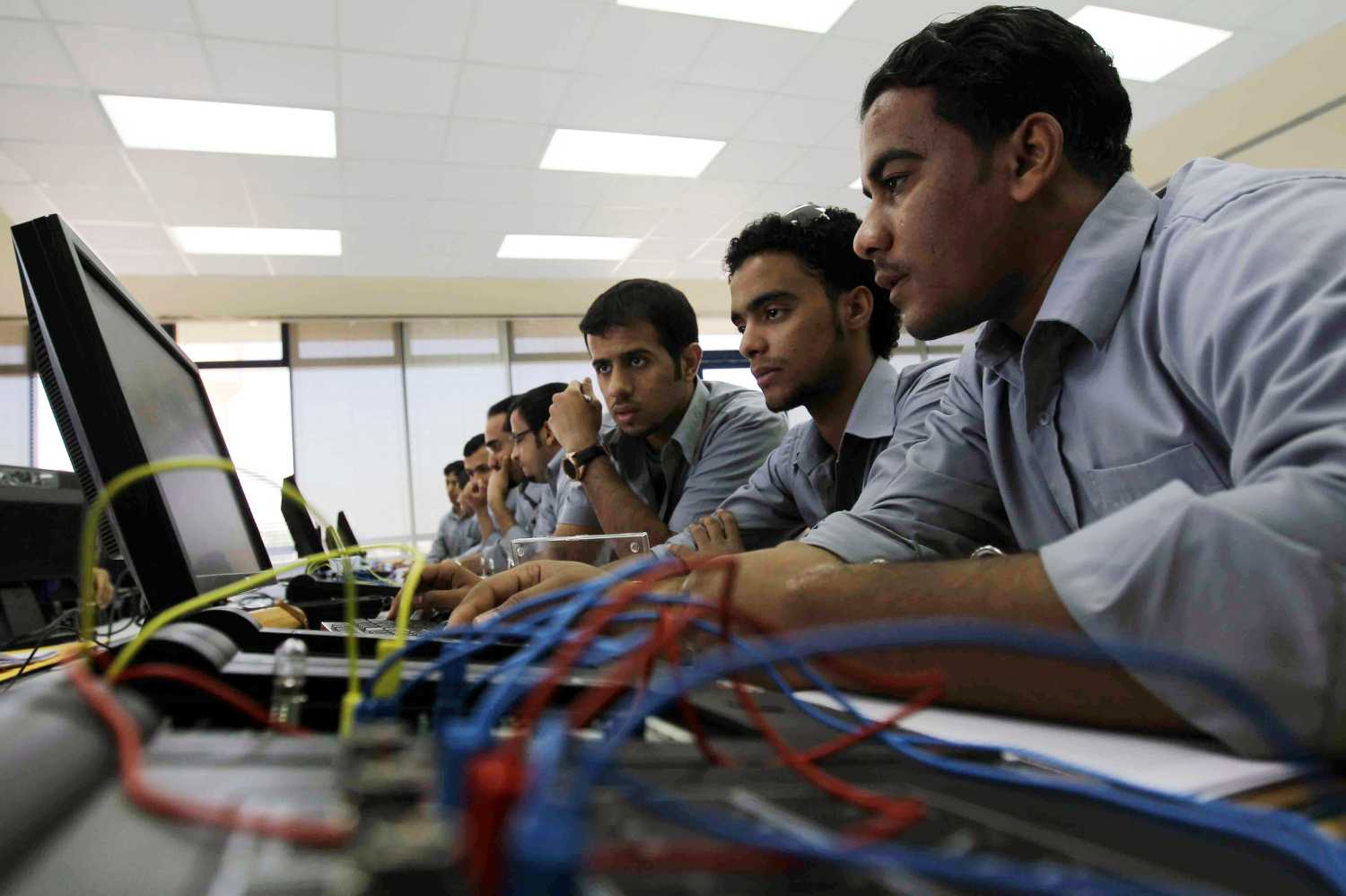 Students use a computer in class