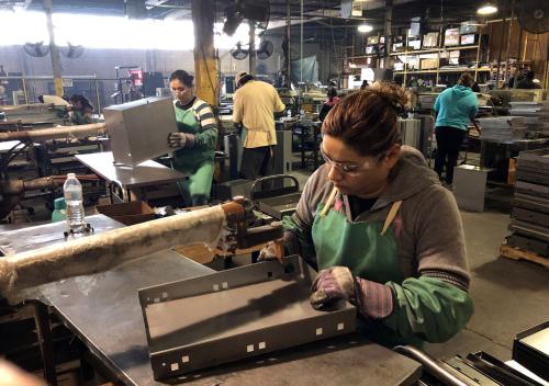 Workers weld drawers on the assembly line at Metal Box International toolbox factory in Franklin Park, Illinois, U.S., February 21, 2018. Picture taken February 21, 2018.