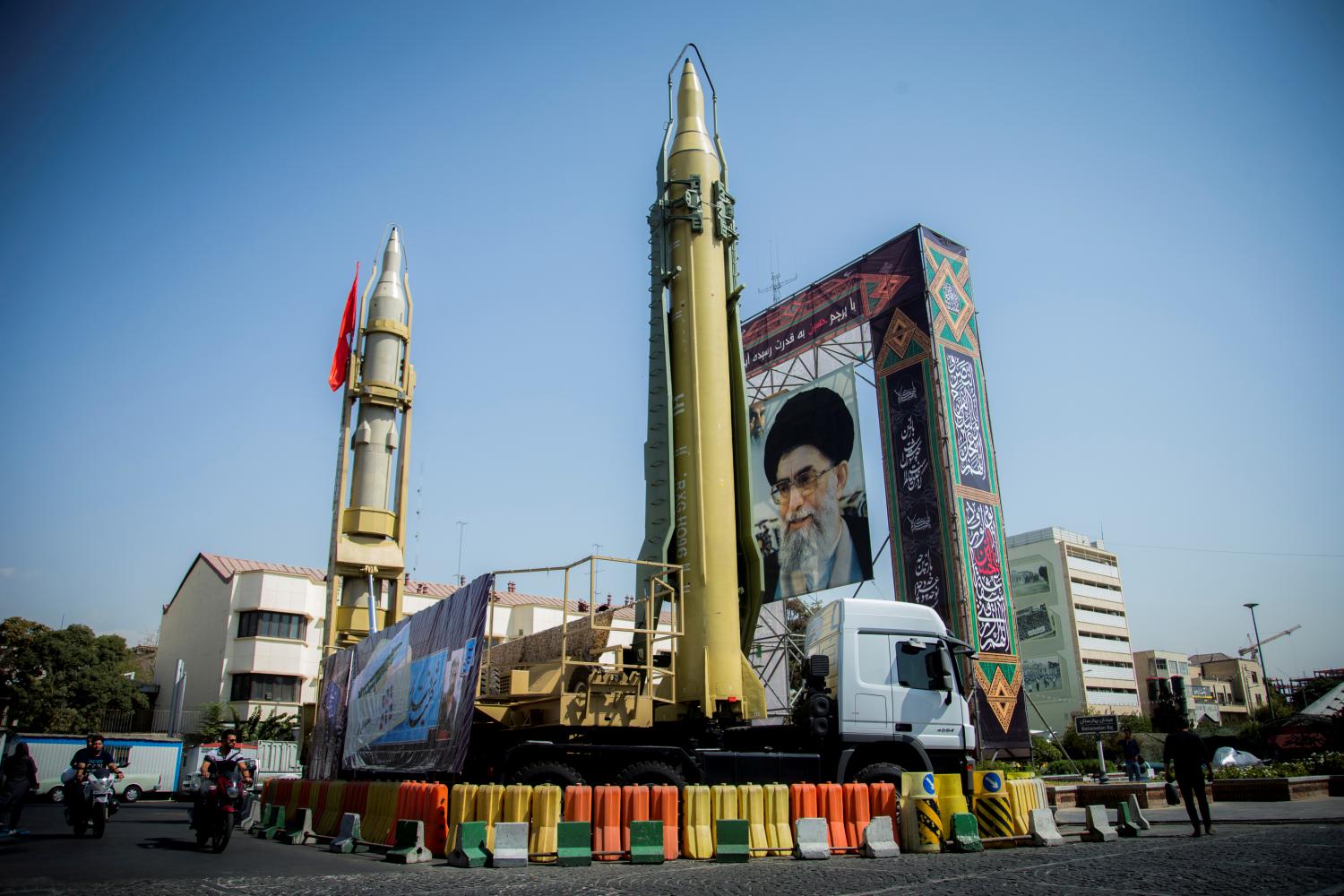 FILE PHOTO: A display featuring missiles and a portrait of Iran's Supreme Leader Ayatollah Ali Khamenei is seen at Baharestan Square in Tehran, Iran September 27, 2017. Picture taken September 27, 2017. Nazanin Tabatabaee Yazdi