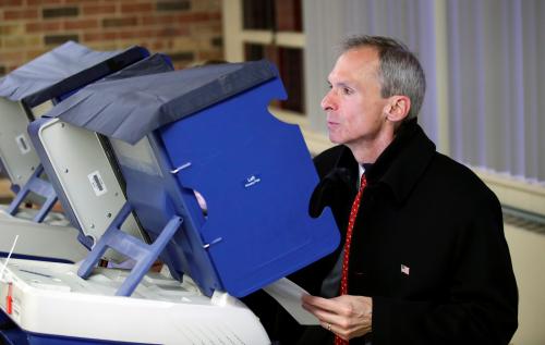 U.S. Congressman Daniel Lipinski votes in the Democratic Party's congressional primary election at St. James Lutheran Church in Western Springs, Illinois, U.S. March 20, 2018. REUTERS/Kamil Krzaczynski - RC1D424A21B0