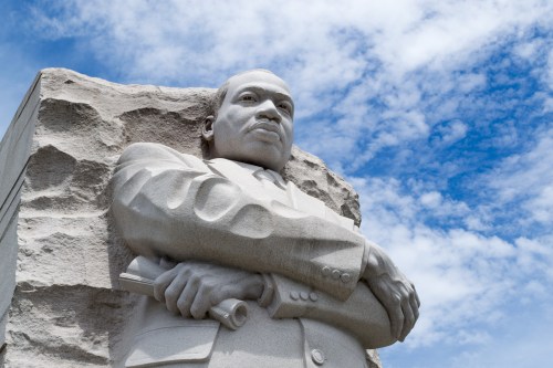 WASHINGTON DC - JULY 30, 2014: The Martin Luther King Jr Memorial, featuring a portrait of the civil rights leader carved in granite, was dedicated by President Barack Obama in 2011.