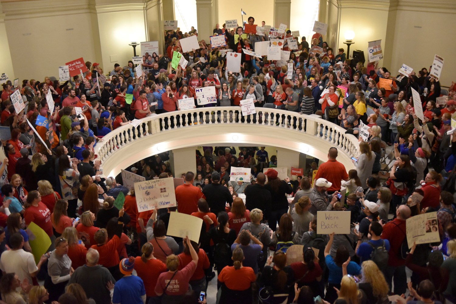 Teachers pack the state Capitol rotunda to capacity on the second day of a teacher walkout to demand higher pay and more funding for education in Oklahoma City