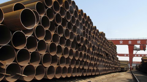 Steel pipes waiting to be loaded and transferred to the port are seen at a steel mill in Cangzhou, Hebei province, China March 19, 2018. Picture taken March 19, 2018. REUTERS/Muyu Xu - RC1CB23F00A0