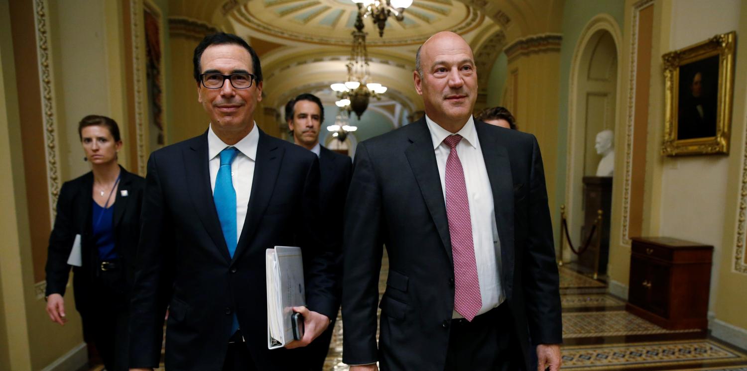 U.S. Secretary of the Treasury Mnuchin and Director of the National Economic Council Cohn walk after meeting with Republican law makers about tax reform in Washington
