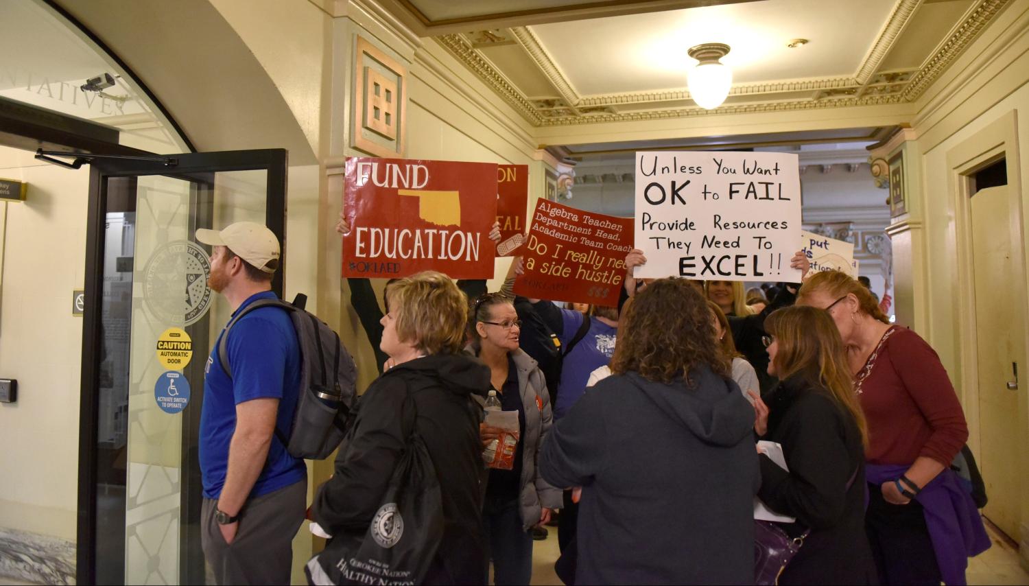 Teachers wait to speak to state representatives at the state Capitol on the second day of a teacher walkout to demand higher pay and more funding for education in Oklahoma City