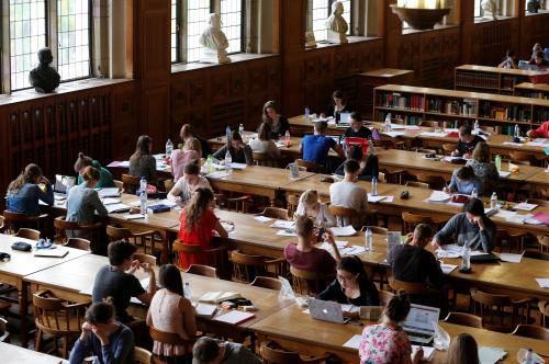 Students sit in the library of the university KU Leuven in Leuven