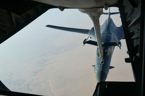 A U.S. Air Force B-1B Lancer bomber, being deployed to launch strikes as part of the multinational response to Syria's use of chemical weapons, is refuelled by a KC-135 tanker aircraft over an undisclosed location, April 14, 2018. U.S. Air Force/Handout via REUTERS. ATTENTION EDITORS - THIS IMAGE WAS PROVIDED BY A THIRD PARTY - RC1C9014E3B0