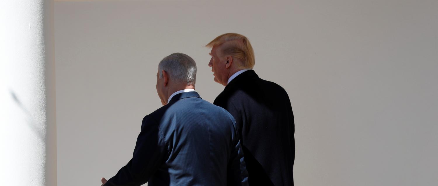 U.S. President Donald Trump and Israel Prime Minister Benjamin Netanyahu walk to the Oval Office of the White House in Washington, U.S., March 5, 2018. REUTERS/Kevin Lamarque - RC1F85EE2CE0