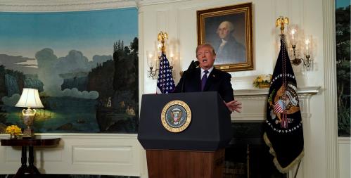 U.S. President Donald Trump announces military strikes on Syria while delivering a statement from the White House in Washington, U.S., April 13, 2018. REUTERS/Yuri Gripas - RC135DB715B0