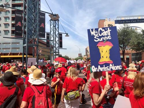 FILE PHOTO: Participants take part in a march in Phoenix, Arizona, U.S., April 26, 2018 in this picture obtained from social media.  Christy Chavis/File Photo via REUTERS   THIS IMAGE HAS BEEN SUPPLIED BY A THIRD PARTY. MANDATORY CREDIT. - RC16A9026150