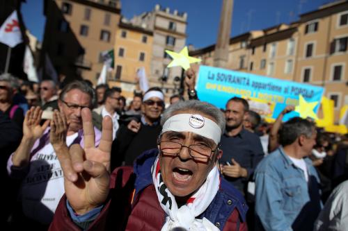 5-Star Movement activists shout slogans during a protest against the new electoral law in downtown Rome, Italy, October 25, 2017. REUTERS/Tony Gentile - RC11FBAE3820