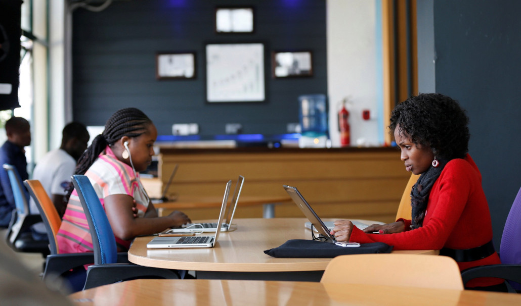 Entrepreneurs work on their projects at Nailab, a Kenyan firm that supports technology startups, behind the latest initiative, which targets entrepreneurs for their ideas on providing sex education through technology and social media in Nairobi, Kenya, July 4, 2016. REUTERS/Thomas Mukoya - D1BETNPFQKAA