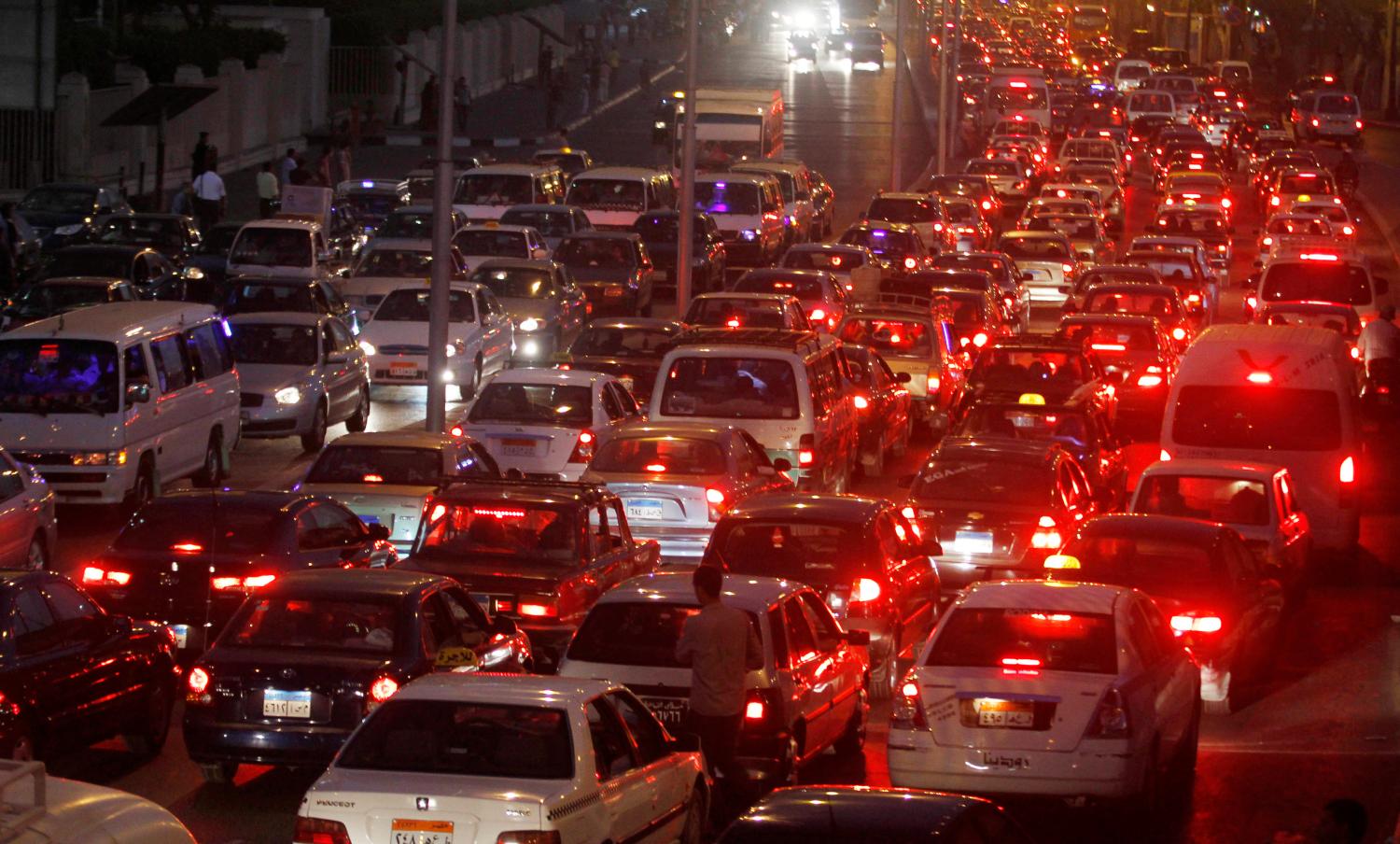 A general view of the traffic on a crowded road in Cairo October 26, 2010. Smog-ridden Cairo's gridlock shows investment in roads, railways and ports is failing to keep pace with economic growth, menacing public health and threatening economic asphyxiation. Around 12,000 deaths occur every year in Egypt because of road accidents, the highest rate in the world per head of population bar Eritrea and the Cook Islands, according to the World Health Organization's most recent report in 2009. The capital's congested roads come to a standstill daily as infrastructure fails to support population growth of 2 percent a year and as thousands of new cars hit the streets every year. Picture taken October 26, 2010. To match Feature EGYPT-BUSINESS/       REUTERS/Mohamed Abd El-Ghany (EGYPT - Tags: BUSINESS SOCIETY TRANSPORT) - GM1E71R08F001