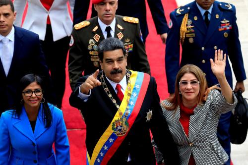 Venezuela's President Nicolas Maduro, flanked by his wife Cilia Flores and National Constituent Assembly President Delcy Rodriguez, arrives for a special session of the National Constituent Assembly to take oath as re-elected President at the Palacio Federal Legislativo in Caracas, Venezuela May 24, 2018.