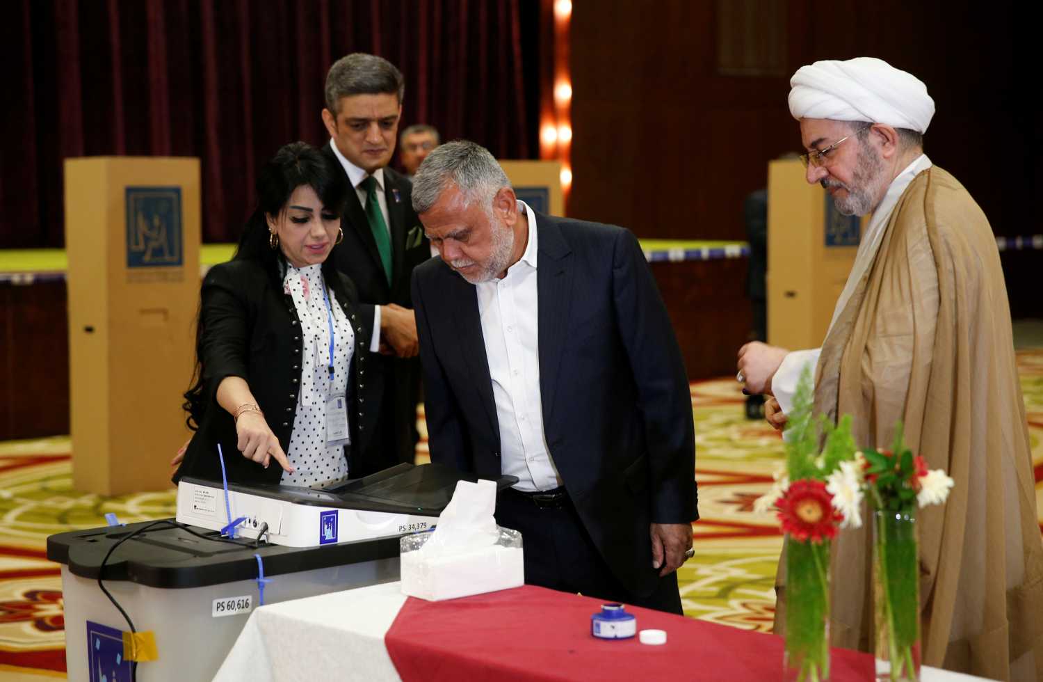 Leader of the Conquest Coalition and the Iran-backed Shiite militia Badr Organisation Hadi al-Amiri attends to casts his vote at a polling station during the parliamentary election in Baghdad, Iraq May 12, 2018. REUTERS/Ahmed Jadallah