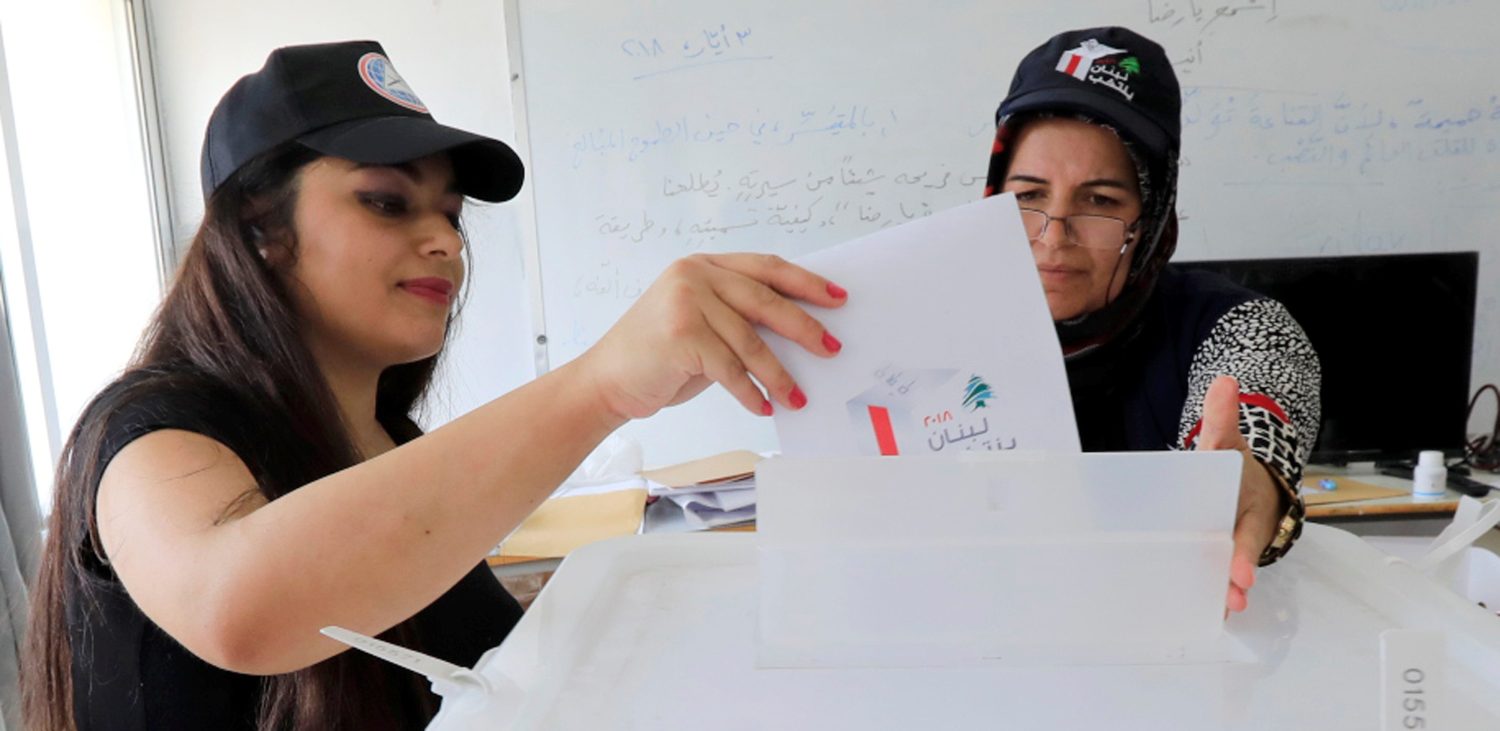 A woman casts her vote at a polling station during the parliamentary election, in Aley, Lebanon, May 6, 2018. REUTERS/ Jamal Saidi - RC1D4073C030