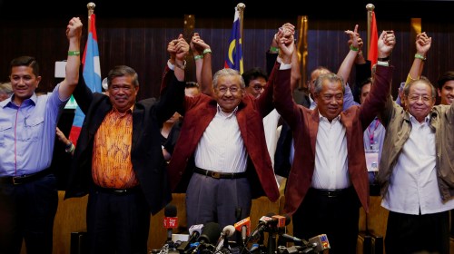 REFILE - CORRECTING DATE    Mahathir Mohamad, former Malaysian prime minister and opposition candidate for Pakatan Harapan (Alliance of Hope) reacts during a news conference after general election, in Petaling Jaya, Malaysia, May 10, 2018. REUTERS/Lai Seng Sin - RC1932AA9080