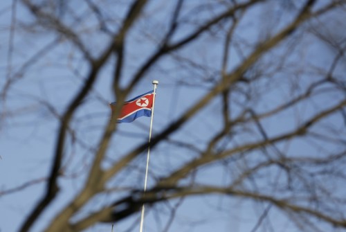 A North Korean flag is seen on the top of its embassy in Beijing, China, February 7, 2016. North Korea launched a long-range rocket on Sunday carrying what it has said is a satellite, South Korea's defense ministry said, in defiance of United Nations sanctions barring it from using ballistic missile technology. REUTERS/Jason Lee - GF10000298918