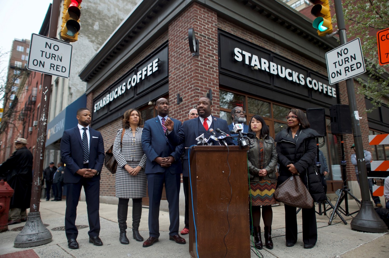 Philadelphia Councilman Kenyatta Johnson (C) addresses the media along with colleagues, outside the Center City Starbucks, where two black men were arrested, in Philadelphia, Pennsylvania U.S. April 16, 2018.  REUTERS/Mark Makela - RC19F6DDA990