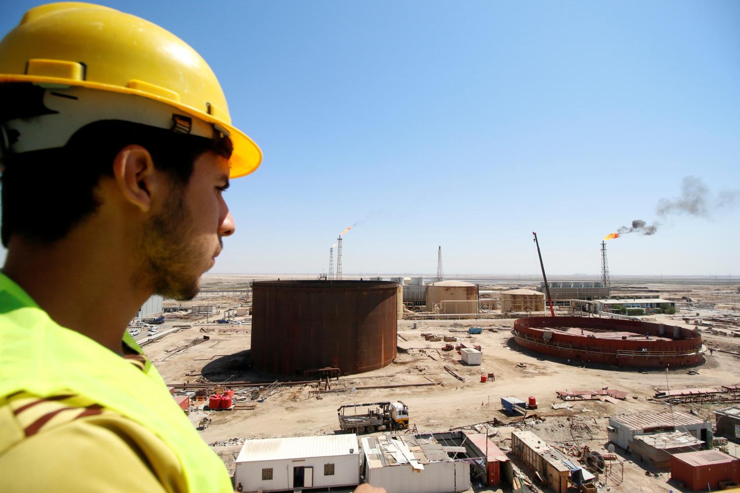 An Iraqi worker looks at the al-Shuaiba oil refinery in southwest Basra, Iraq April 20, 2017. REUTERS/Essam Al-Sudani -