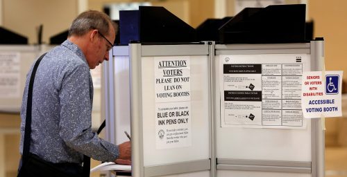 A man votes as District of Columbia voters head to the polls in the final 2016 U.S. Democratic primary in Washington, DC.