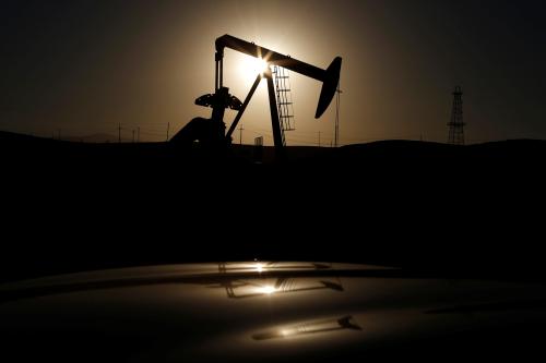 A pump jack is seen at sunrise near Bakersfield, California October 14, 2014.   REUTERS/Lucy Nicholson/File Photo - S1AEULTMYXAA