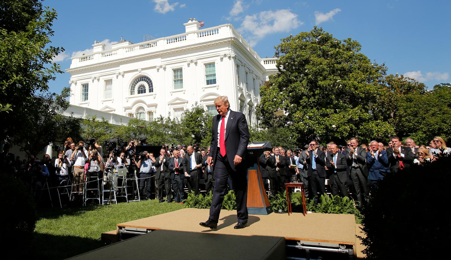 U.S. President Trump departs after announcing his decision to withdraw from Paris Climate Agreement at White House Rose Garden.