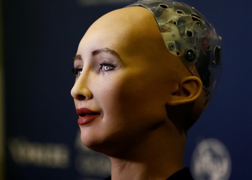 Sophia, a robot integrating the latest technologies and artificial intelligence developed by Hanson Robotics is pictured during a presentation at the "AI for Good" Global Summit at the International Telecommunication Union (ITU) in Geneva, Switzerland June 7, 2017. REUTERS/Denis Balibouse - RC16B89A9020