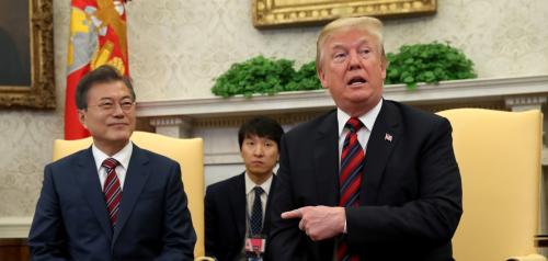 U.S. President Donald Trump gestures as he welcomes South Korea's President Moon Jae-In in the Oval Office of the White House in Washington, U.S., May 22, 2018. REUTERS/Kevin Lamarque - RC13C7FA4FB0