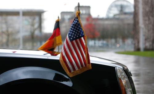 U.S. and German flags are seen on a limousine. November 17, 2016. REUTERS/Fabrizio Bensch - LR1ECBH17DKKQ